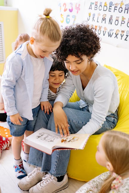 Young woman reading book to children
